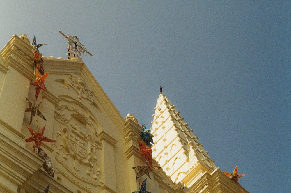 Church facade with colourful star decorations