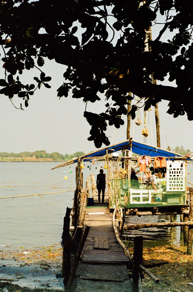 Wooden walkway leading to a fishing platform