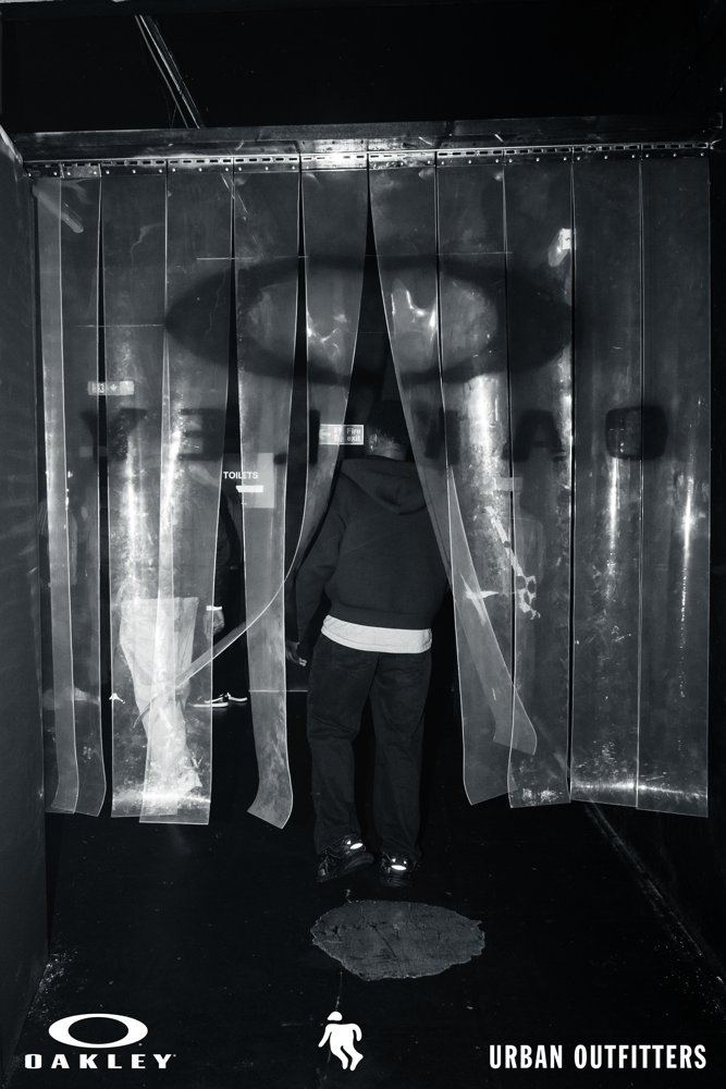 Guest entering through a strip curtain at the Oakley and Urban Outfitters event