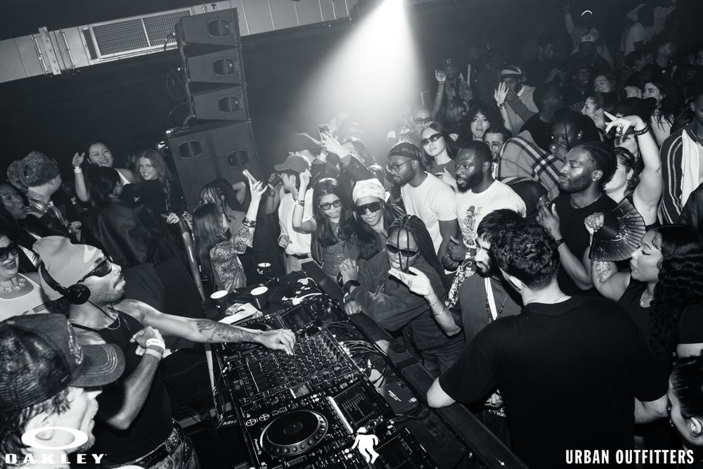 Crowd surrounding the DJ booth at the Oakley and Urban Outfitters event