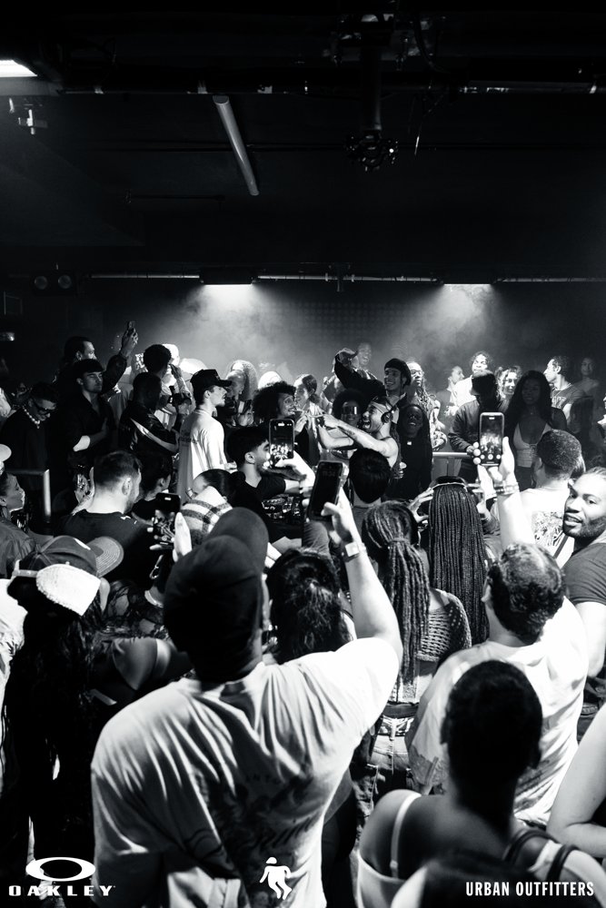 Guests cheering around the DJs at the Oakley and Urban Outfitters event